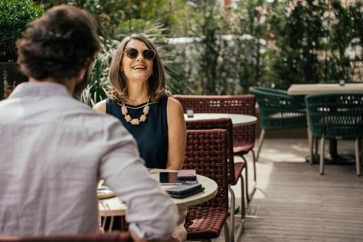 Couple eating outside at a restaurant